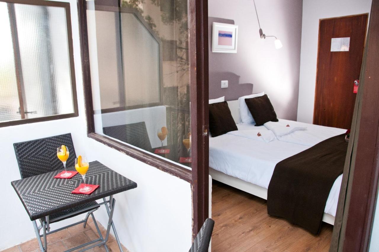 Seven Hostal كالا مييور الغرفة الصورة